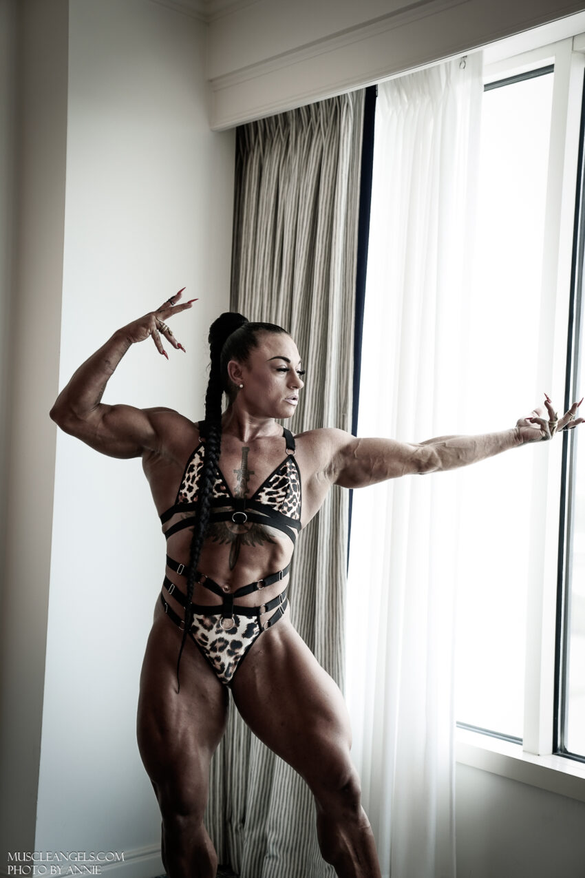 Rachel Daniels female bodybuilder poses for photoshoot